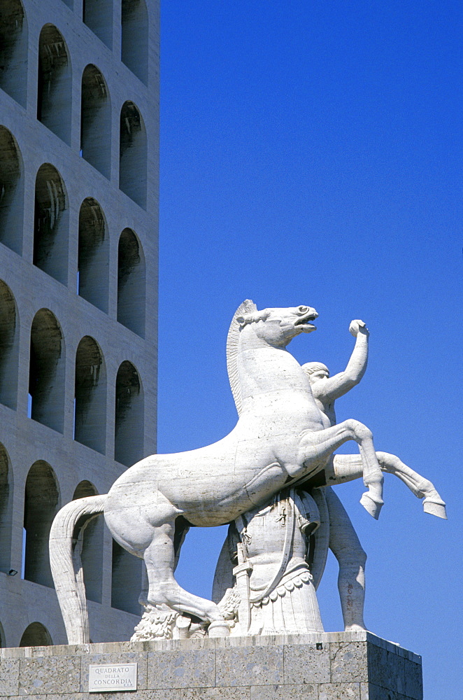 Sculpture in front of Palazzo della Civilta Italiana, the Palace of Italian Civilization in the EUR quarter, Rome, Italy, Europe