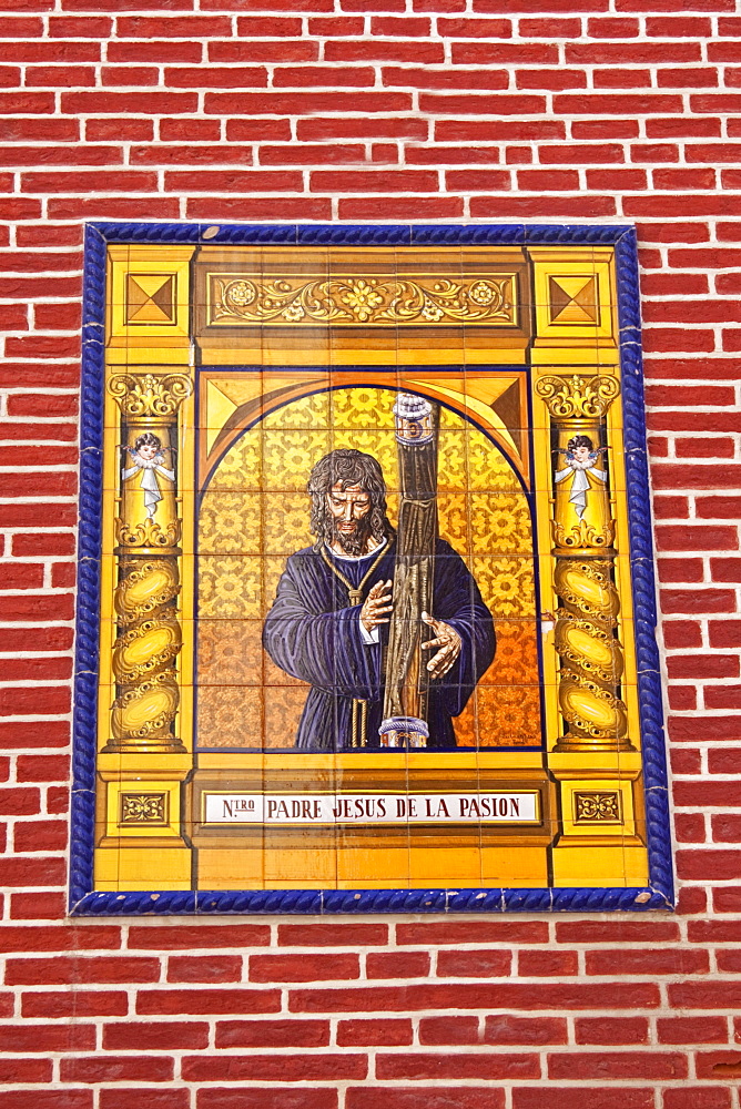 Tile mural of Jesus on the Iglesia de los Martires or Church of Martyrs, Malaga, Andalusia, Spain, Europe