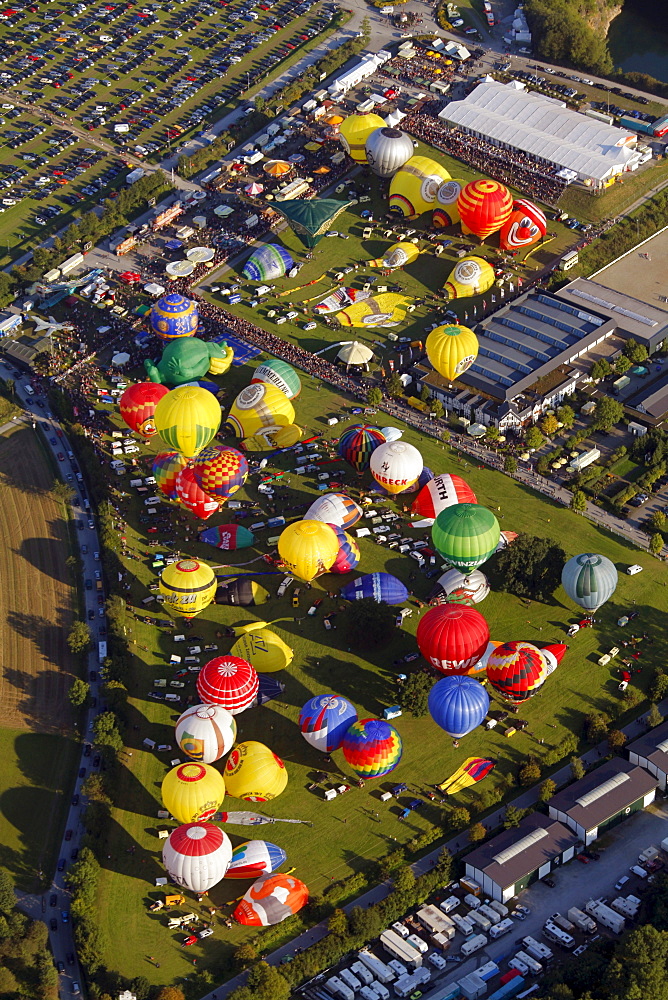 Aerial view, 20th Warsteiner Montgolfiade, hot air balloon festival with nearly 200 hot air balloons ascending into the sky, Warstein, Sauerland, North Rhine-Westphalia, Germany, Europe