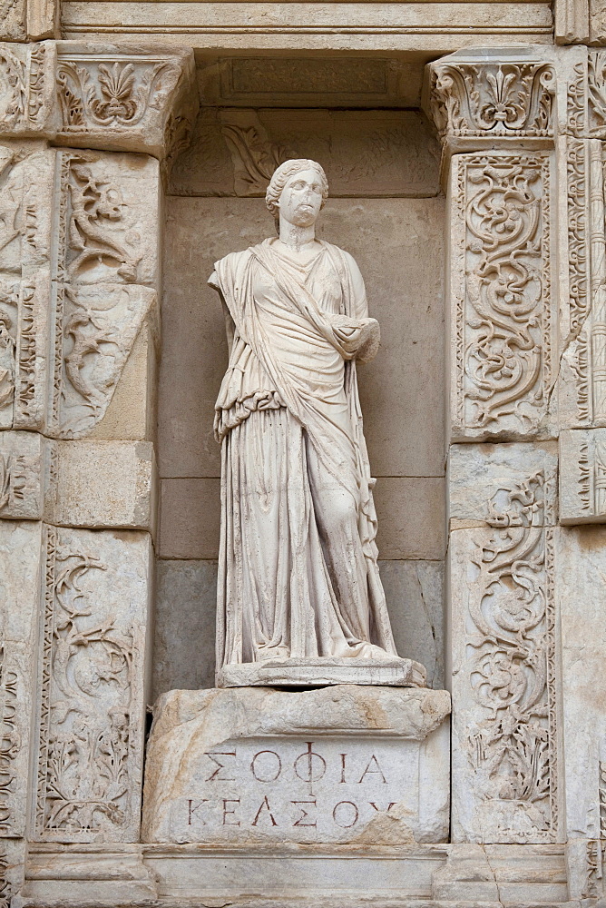 Statue in front of the Celsus Library, Ephesus, Selcuk, Lycia, Turkey, Asia