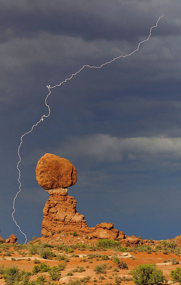 Balanced Rock, rock formation, thunderstorm clouds, lightning, Arches National Park, Moab, Utah, Southwestern United States, United States of America, USA