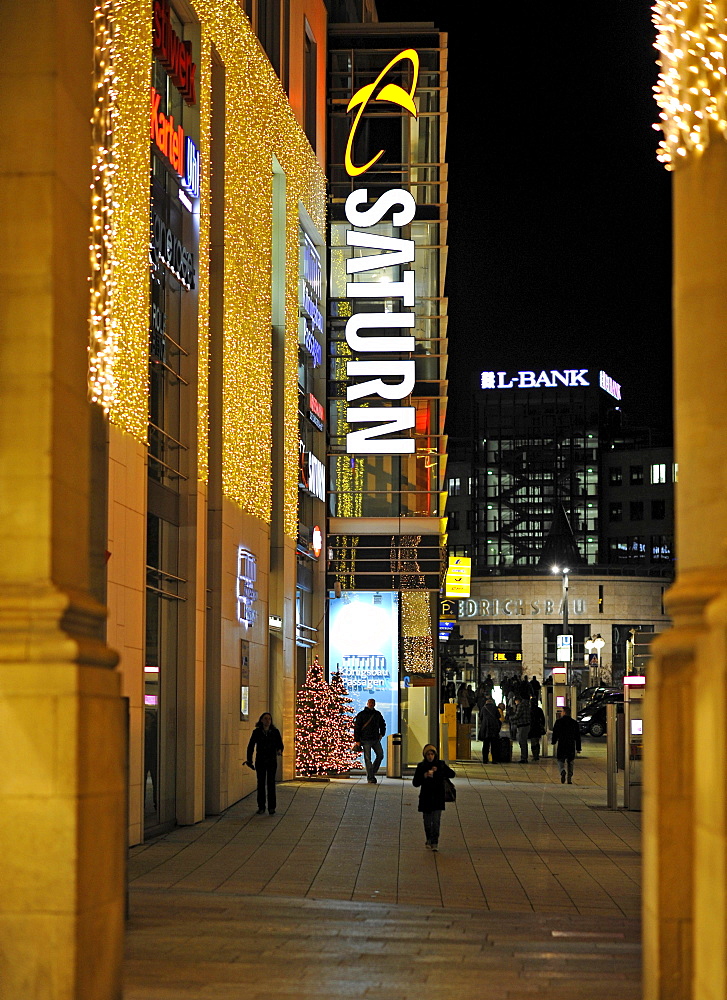 Saturn, an electronic trading store, decorated for Christmas at night, Koenigsbau, Stuttgart, Baden-Wuerttemberg, Germany, Europe