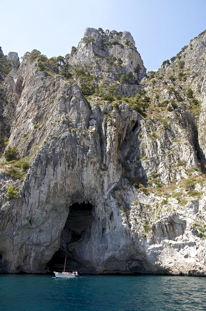 Boat in front of the White Grotto, Grotta Bianca, east coast of the island of Capri, Italy, Europe