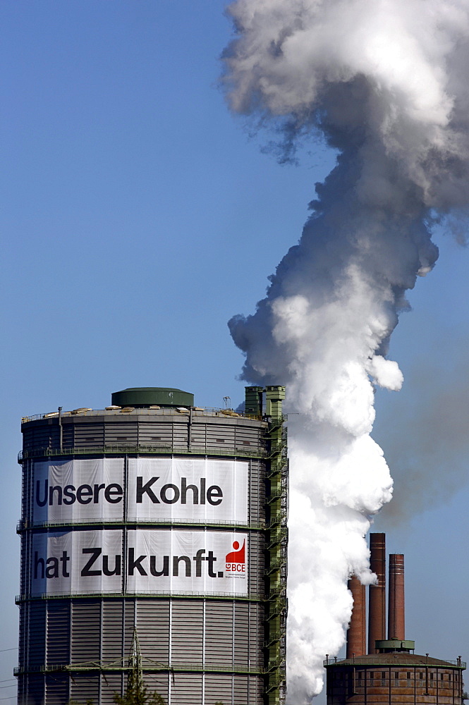 Gas holder, Kokerei Prosper coking plant with a large poster of the IGBCE trades union with a lettering "Unsere Kohle hat Zukunft", German for "Our coal industry has a future", protest against the closure of coal plants in Germany and the reduction of sub