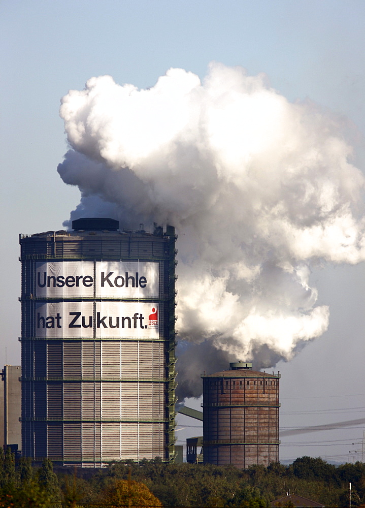 Gas holder of the Kokerei Prosper coking plant, with a large poster of the IGBCE trades union with a lettering "Unsere Kohle hat Zukunft", German for "Our coal industry has a future", protest against the closure of coke plants and the reduction of subsidi