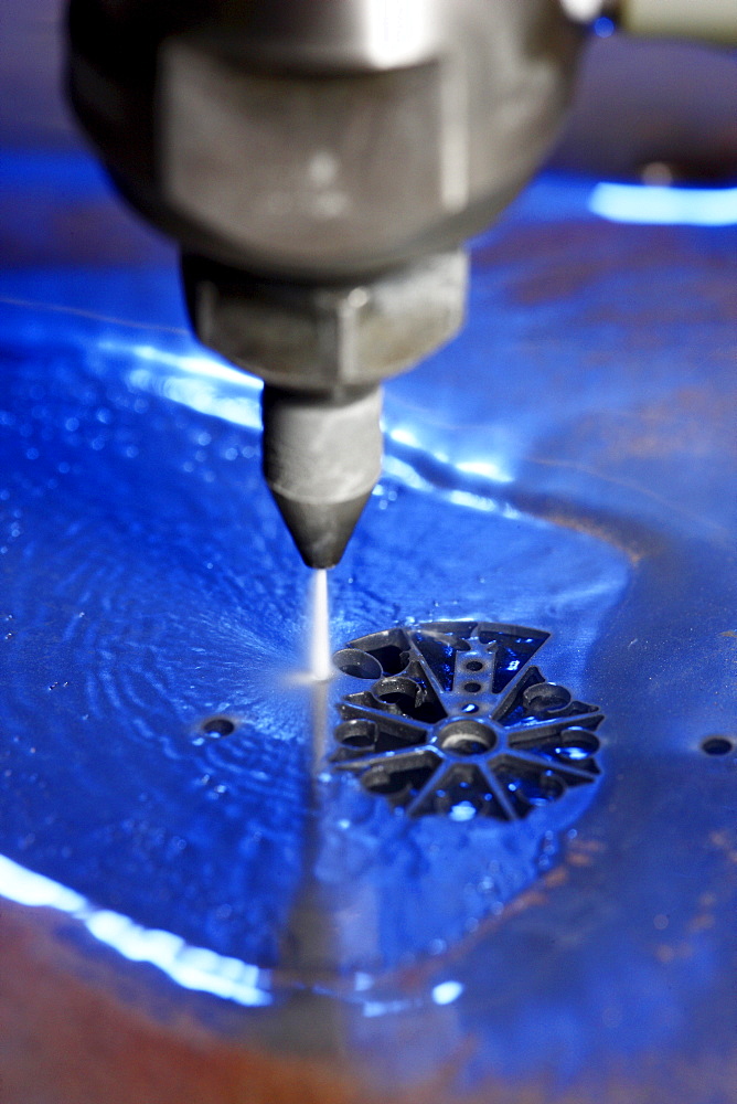 Water jet technology, precise technology for cutting metal with a high pressure water jet, where an abrasive material is added to the water, Waterjet company, Aarwangen, Switzerland, Europe