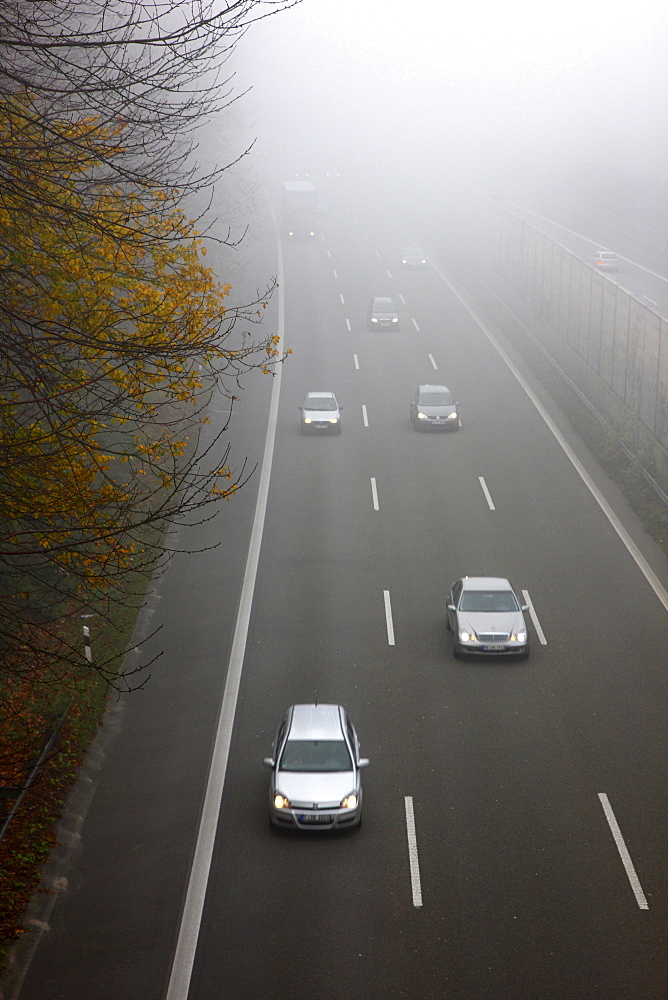 A52 motorway in thick fog, autumn, visibility below 100 metres, Essen, North Rhine-Westphalia, Germany, Europe