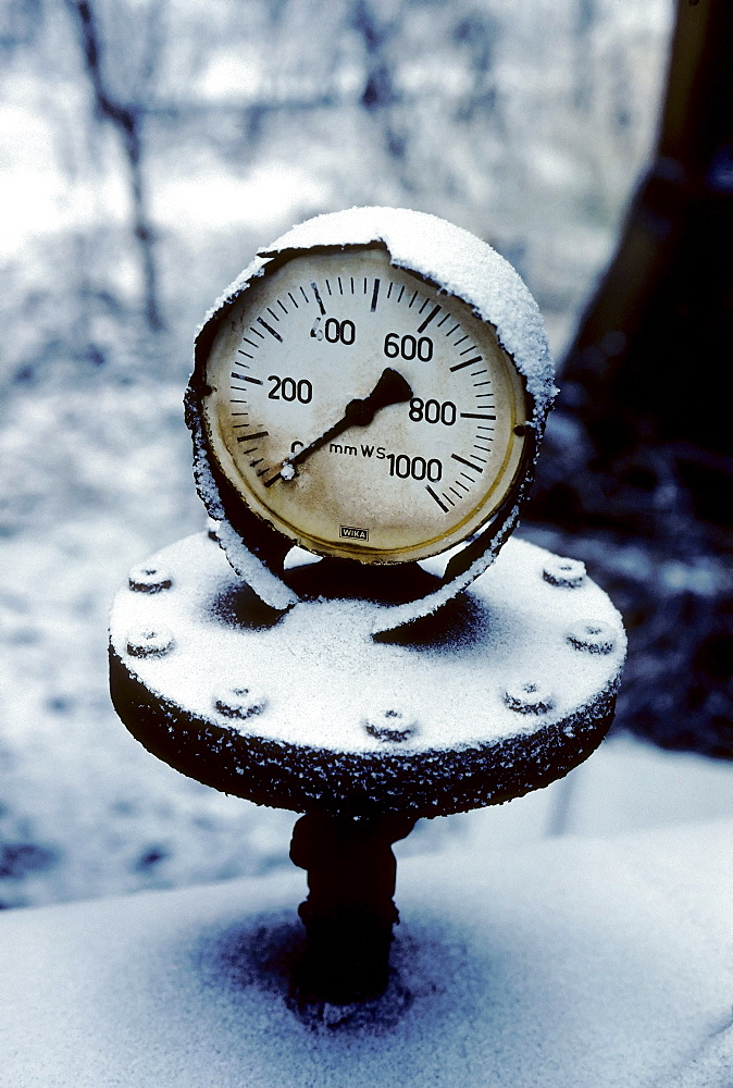 Snow-covered pressure gauge, Huettenwerk Meiderich steel mill after closure, today Duisburg-Nord Landscape Park, North Rhine-Westphalia, Germany, Europe