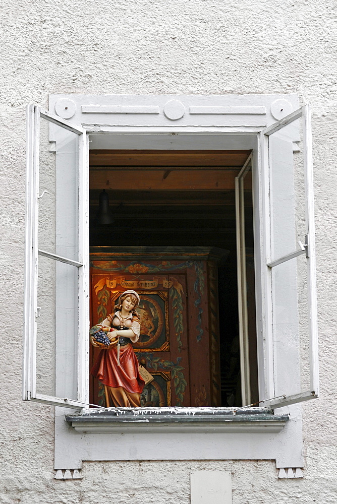 Antique shop window with statue, historic centre of Salzburg, Austria, Europe