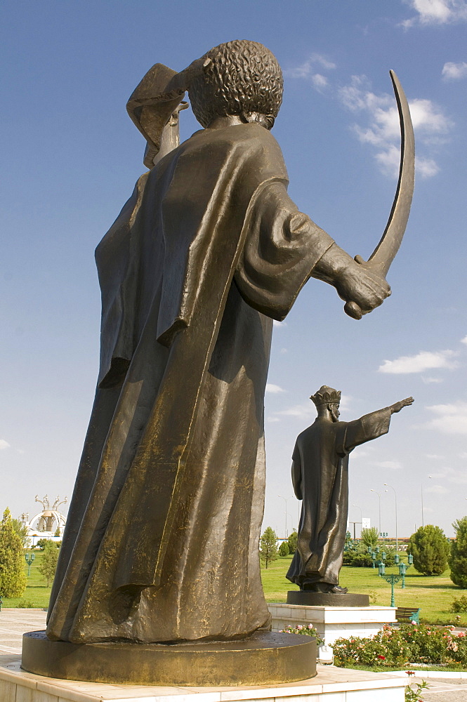 Statue with a sword in front of the Independence Monument of Turkmenistan, Ashgabat, Turkmenistan, Central Asia