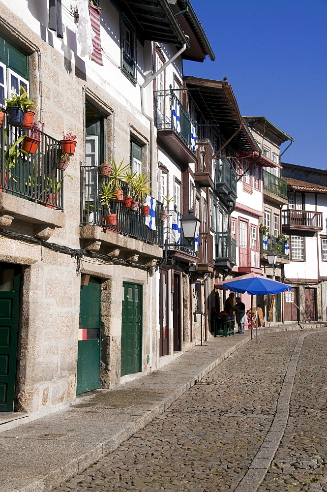 Houses in a street of the historic district of Guimaraes, Portugal, Europe