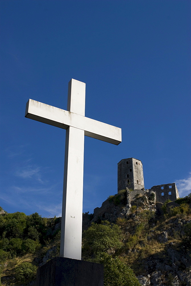 Cross in front of a fortress, Pocitelj, Bosnia, Europe