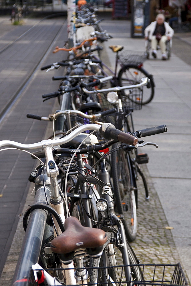 Parked bicycles and pavement in the city, Berlin, Germany, Europe