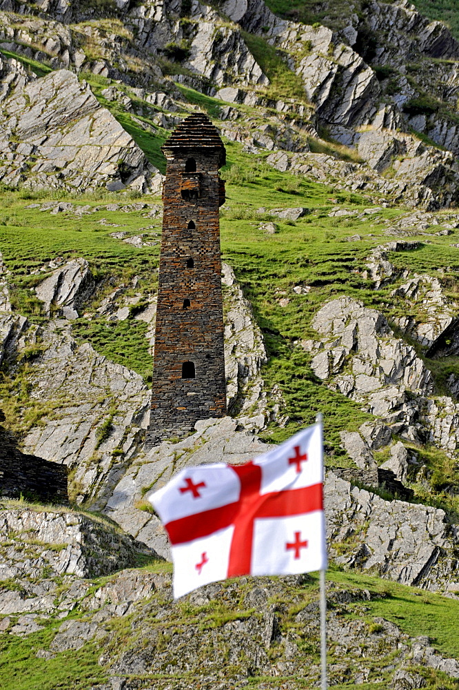 Signal tower with the flag of Georgia, Girevi, Tusheti, Georgia, Western Asia