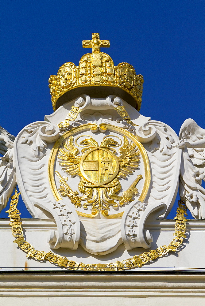 Imperial crown and coat of arms on the roof of the Hofburg Imperial Palace, Vienna, Austria, Europe