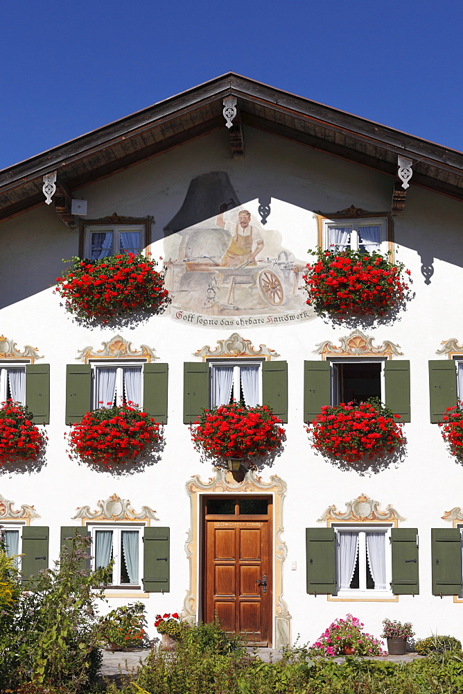 House with a mural of a blacksmith, Jachenau-Muehle, Isarwinkel, Upper Bavaria, Bavaria, Germany, Europe