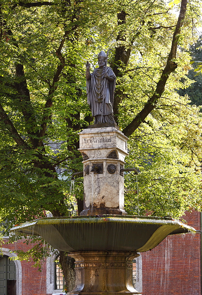 Fountain with a statue of St. Vigilius, Virgilius, in the courtyard of Ancient Salt Works, Bad Reichenhall, Berchtesgadener Land district, Upper Bavaria, Germany, Europe