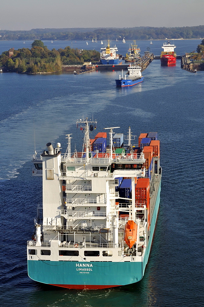 Shipping container ships at Holtenau lock, Kiel Canal, Kiel, Schleswig-Holstein, Germany, Europe