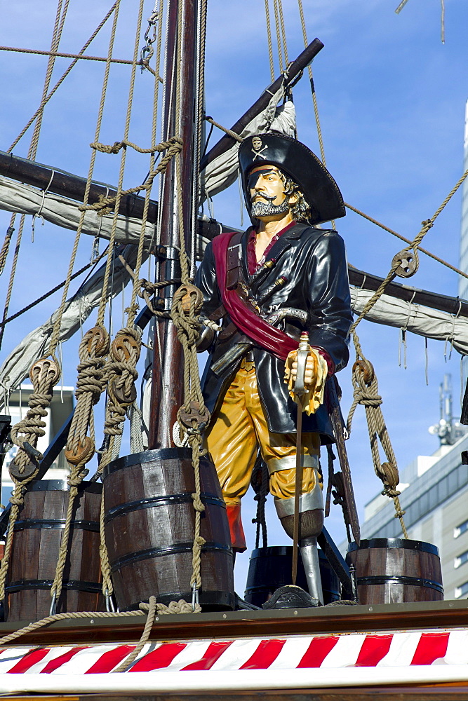 Statue of a pirate on an old sailing ship