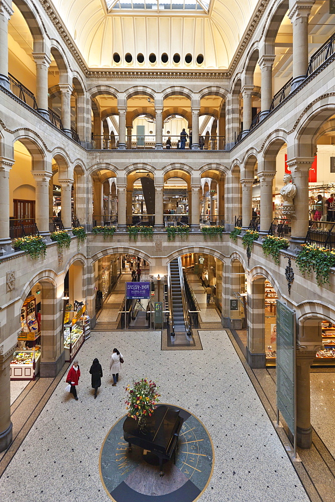 Arcades in the inner courtyard of Magna Plaza shopping centre in the former building of the Main Post Office, Nieuwezijds Voorburgwal, Amsterdam, Holland, Netherlands, Europe