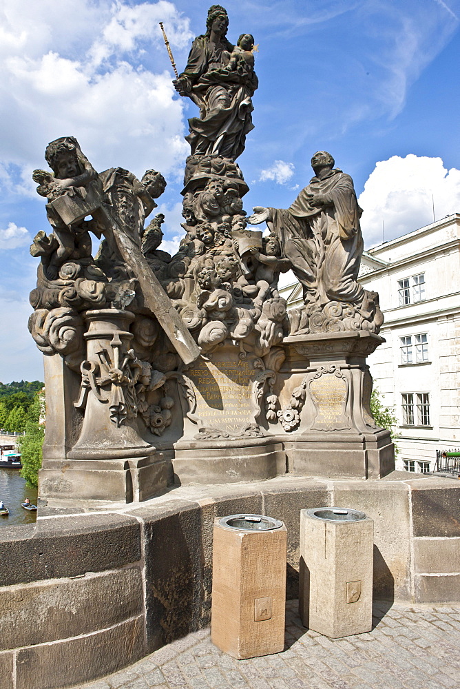 Statue of the Madonna attending to St. Bernard, Charles Bridge, Vltava river, UNESCO World Cultural Heritage, Prague, Czech Republic, Europe