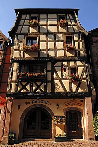 Old half-timbered house with flower boxes, Rue du General de Gaulle 45, Riquewihr, Alsace, France, Europe