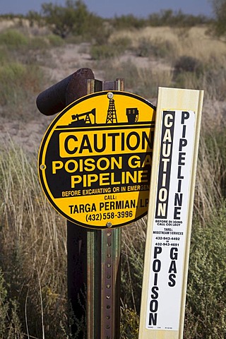 A sign warns of an underground natural gas pipeline in Grandfalls, west Texas, USA