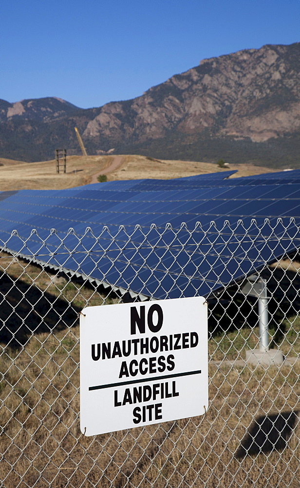 A solar photovoltaic facility, built on top of a former landfill at the U.S. Army's Fort Carson uses contaminated land to generate renewable energy and generates 3, 200 megawatt-hours of power every year, Colorado Springs, Colorado, USA