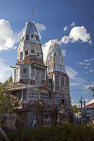 Cano's Castle, built by Donald "Cano" Espinoza, a Native American and Vietnam veteran who built the Christian-themed structure from beer cans, hub caps, and other scrap materials, in thanks for his life being spared in Vietnam, Antonito, Colorado, USA