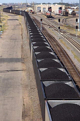 An eastbound train hauling coal from western strip mines passes through the Union Pacific Railroad's Bailey Yard, the largest rail yard in the world which handles 14, 000 rail cars every day, North Platte, Nebraska, USA