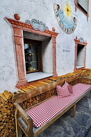Wooden bench and sundial, Neustift, Stubaital Valley, Tyrol, Austria, Europe