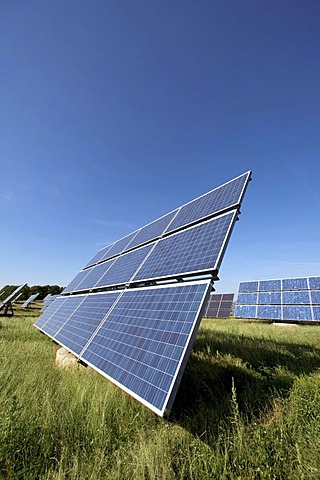 Solar panels mounted on so called Movers, moving in circles around their axes with the movement of the sun, Gut Erlasee Solar Park, Arnstein, Bavaria, Germany, Europe