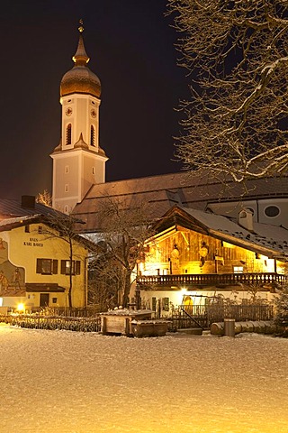 Town view with St. Martin parish church, public library, Mohrenplatz square, snow, blue hour, Garmisch-Partenkirchen, Upper Bavaria, Bavaria, Germany, Europe