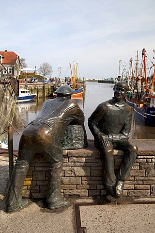 Sculptures, old and young fisherman, harbour, Neuharlingersiel, East Frisia, Lower Saxony, Germany, Europe