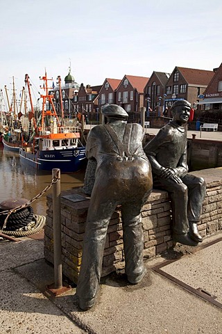 Sculptures, old and young fisherman, harbour, Neuharlingersiel, East Frisia, Lower Saxony, Germany, Europe