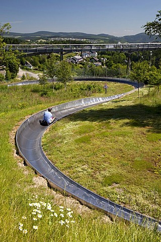 Summer toboggan run and panoramic bridge at the Erlebnisberg Kappe recreational park, Winterberg, Sauerland, North Rhine-Westphalia, Germany, Europe