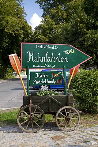 Wooden cart with sign advertising boat rides, Schlepzig, Spreewald, Spree Forest, Brandenburg, Germany, Europe