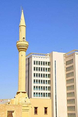 Minaret in front of a high-rise building in the historic centre of Beirut, Lebanon, Middle East, Asia