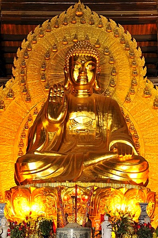 Buddha statue, the largest and heaviest bronze statue in Vietnam inside the Chua Bai Dinh pagoda, currently a construction site, to become one of the largest pagodas in Southeast Asia, near Ninh Binh, Vietnam, Southeast Asia