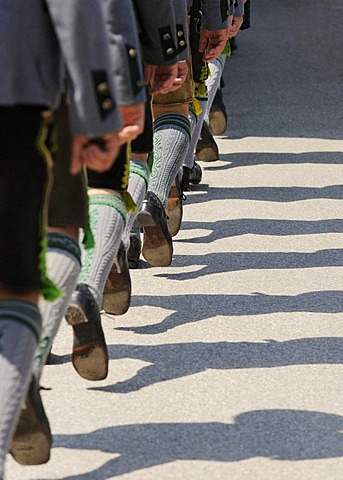 Trachtler wearing traditional costume marching in step, detail of legs, Loisachgau Trachtenfest folklore festival, Neufahrn, Upper Bavaria, Bavaria, Germany, Europe