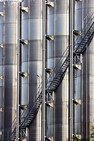 Steep stairs leading up stainless steel tanks, chemical industry, storage tanks for chemical products, Germany, Europe