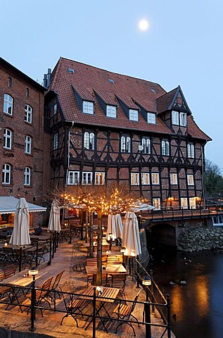 Restaurant terrace on the Ilmenau river, Bergstroem four-star hotel, evening mood, old town, Lueneburg, Lower Saxony, Germany, Europe