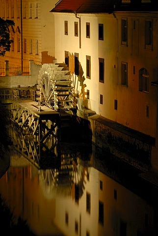 Water wheel below Charles Bridge in Prague, Czech Republic, Europe