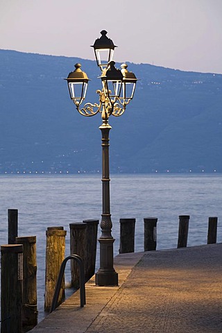 Streetlight at the port of Gargnano, Lake Garda, Lombardy, Italy, Europe