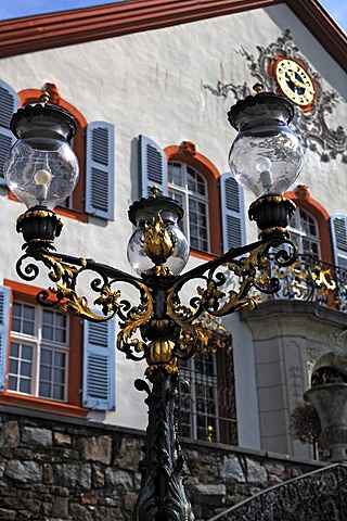 Ancient three-armed lamp in front of the stairway at Buergeln Castle, castle facade at the back, Schliengen, Baden-Wuerttemberg, Germany, Europe