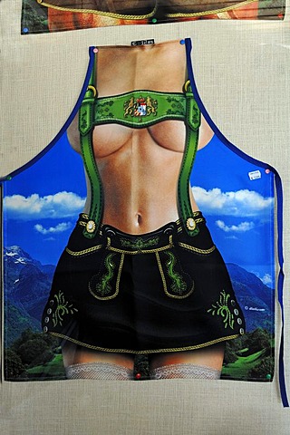 Kitchen apron with the picture of a bare-breasted woman in traditional costume, souvenir shop, Mittenwald, Upper Bavaria, Bavaria, Germany, Europe