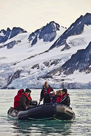 Ice, fjord, Zodiac rubber boat in the Fuglefjord in front of a glacier, Svalbard, Spitsbergen, Norway