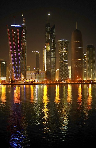 Night shot of the Doha skyline, Tornado Tower, Navigation Tower, Peace Towers, Al-Thani Tower, Doha, Qatar, Persian Gulf, Middle East, Asia