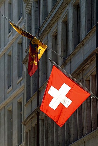 Genevan and Swiss flag in the Rue de l'Hotel de Ville in the historic centre of Geneva, Switzerland, Europe