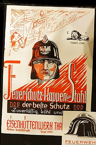 Man with historical steel fire helmet, title illustration of an advertising brochure, Huettenmuseum Thale ironworks museum, Thale, Harz, Saxony-Anhalt, Germany, Europe